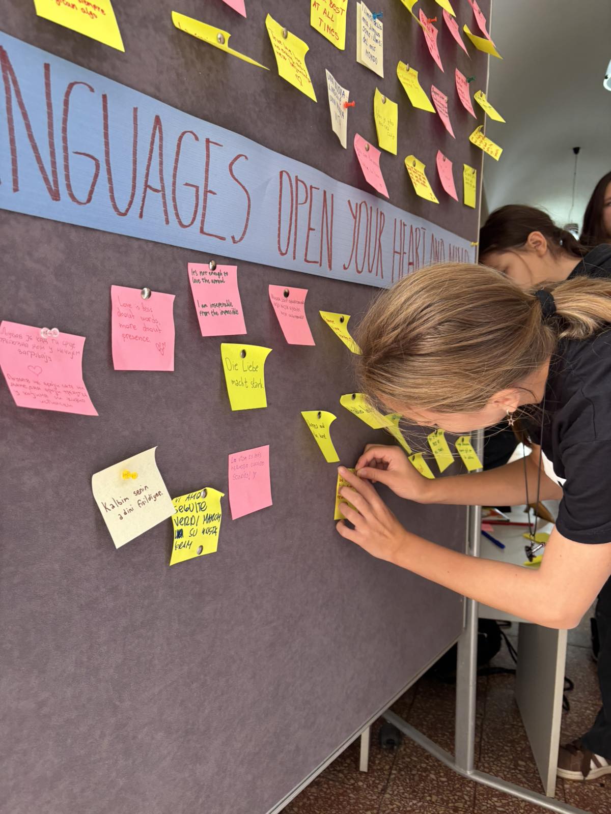 A person writing on a board
AI-generated content may be incorrect.