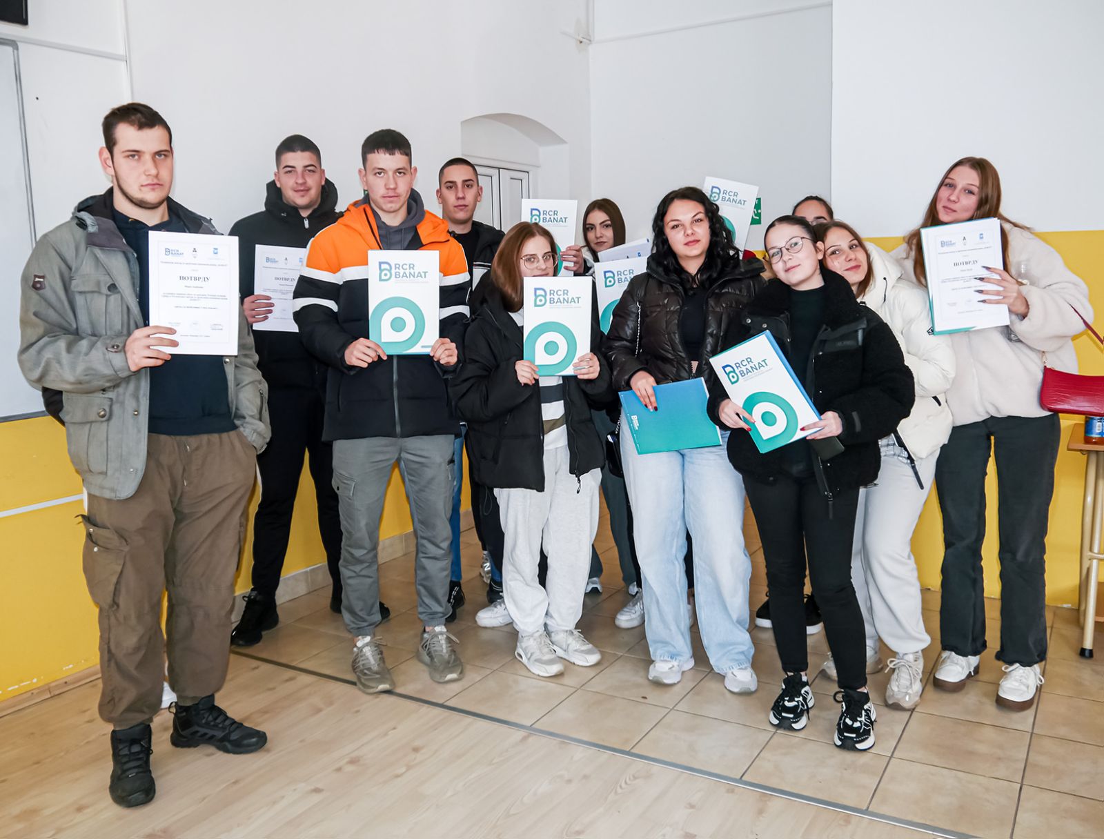 A group of people holding signs

AI-generated content may be incorrect.