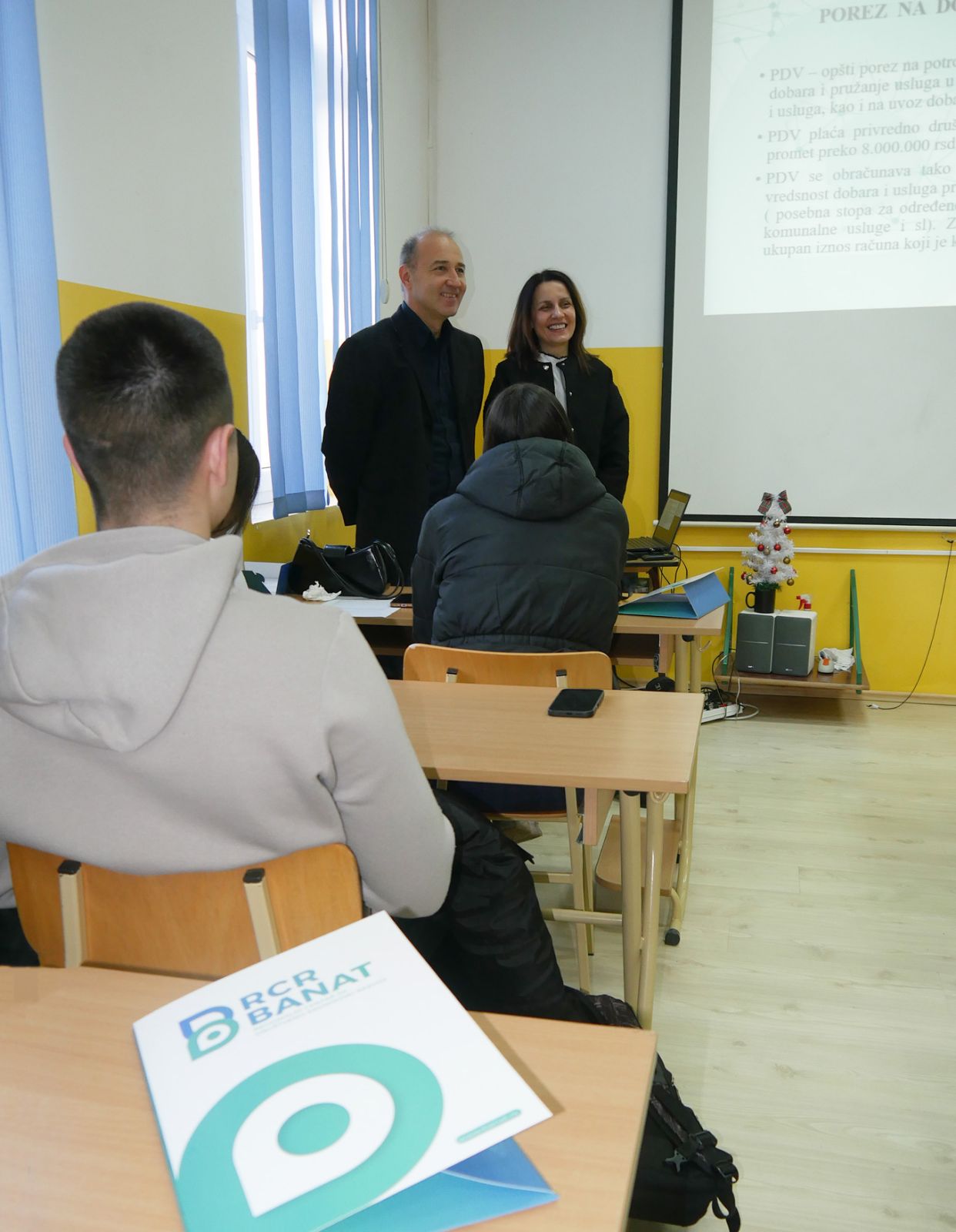 A group of people in a classroom

AI-generated content may be incorrect.