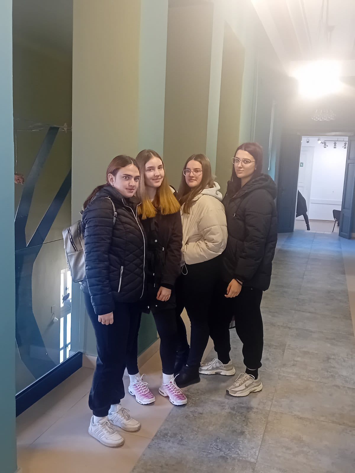 A group of women standing together
AI-generated content may be incorrect.